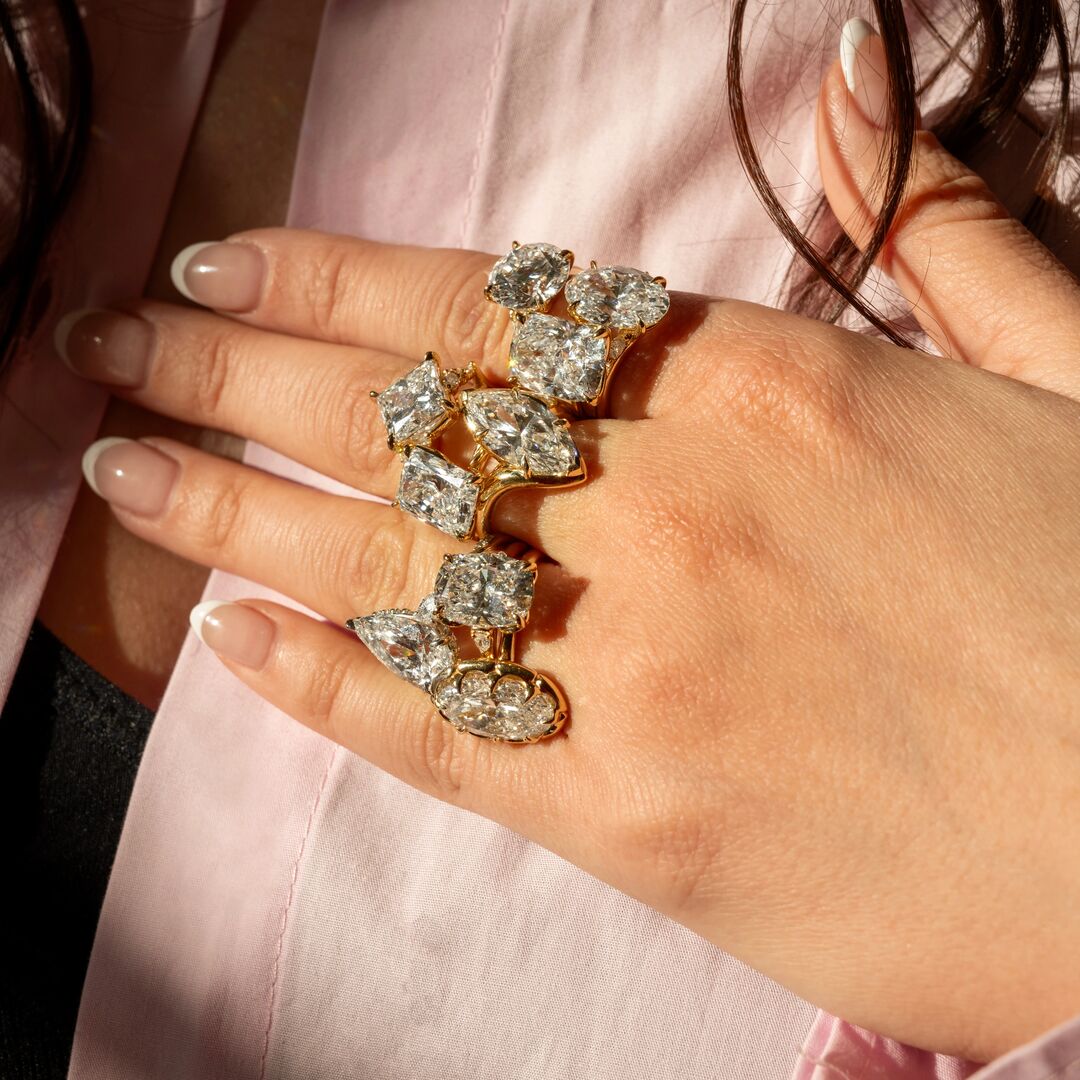 Spring2026_Internal08-Feed-square-1 | Frank Darling Woman wearing 9 different diamond engagement rings