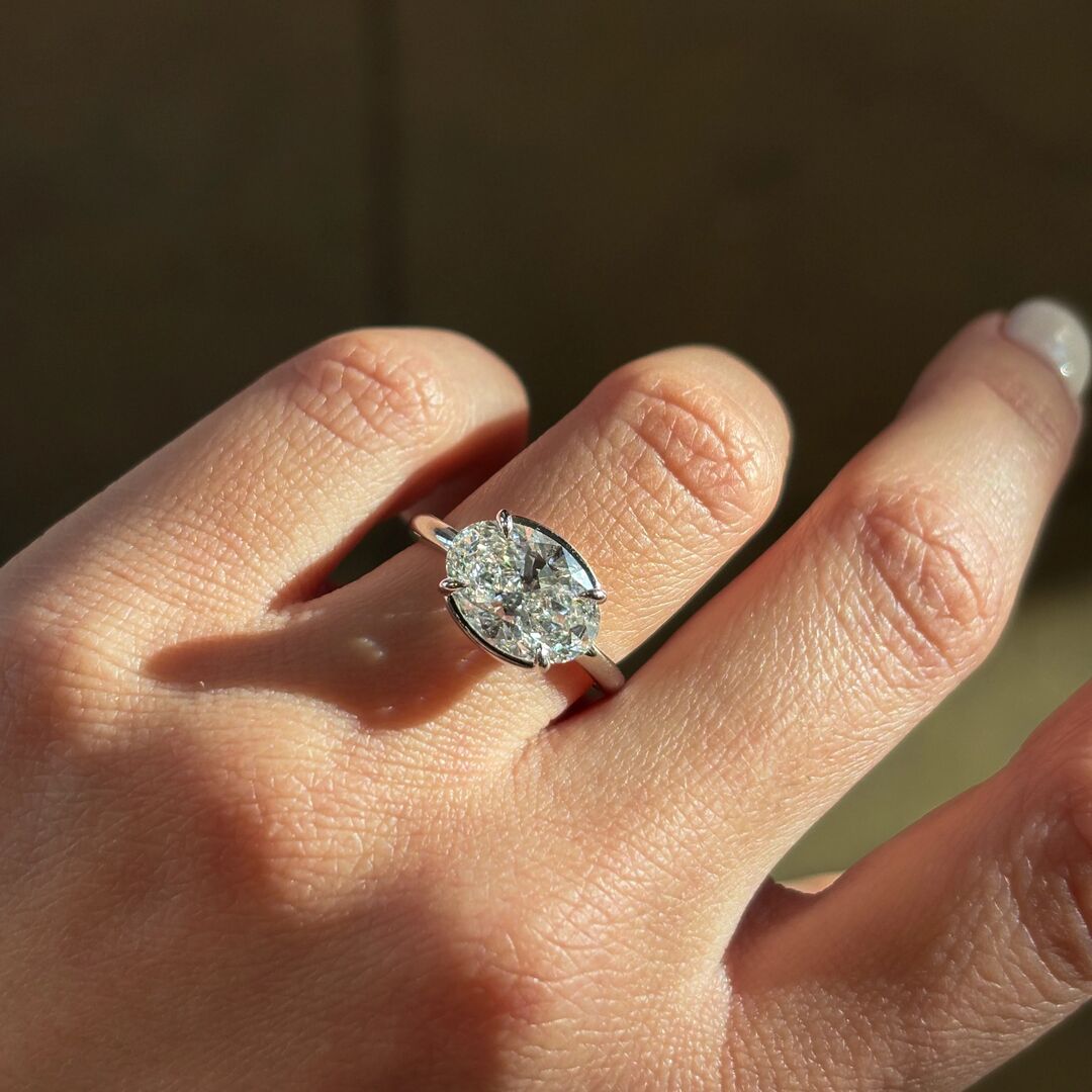 clutchette-Feed-square-1-1 | Frank Darling east west oval set platinum engagement ring